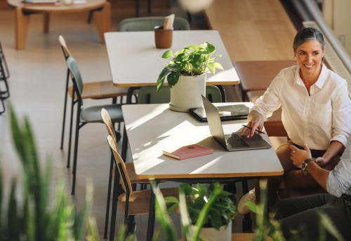 male and female accountants in a meeting in a cafe