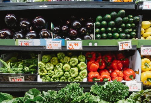Supermarket shelf showing fruit and vegetables