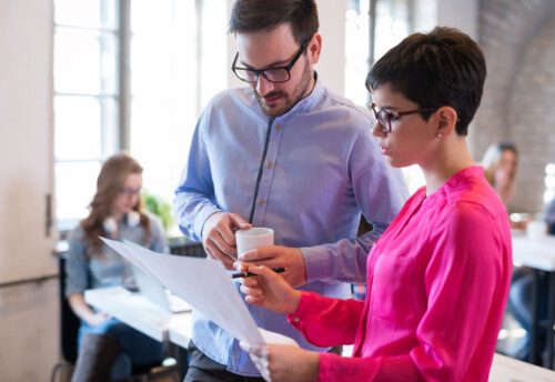 Creative young business people and architects working in office
